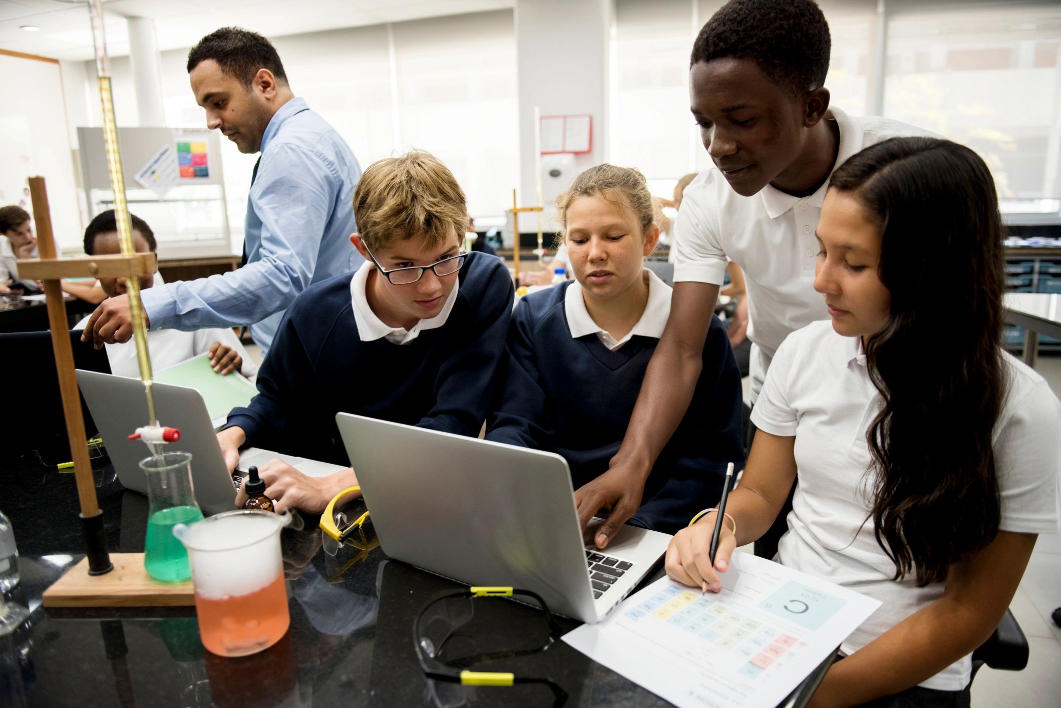 Group of students in a science classroom laboratory